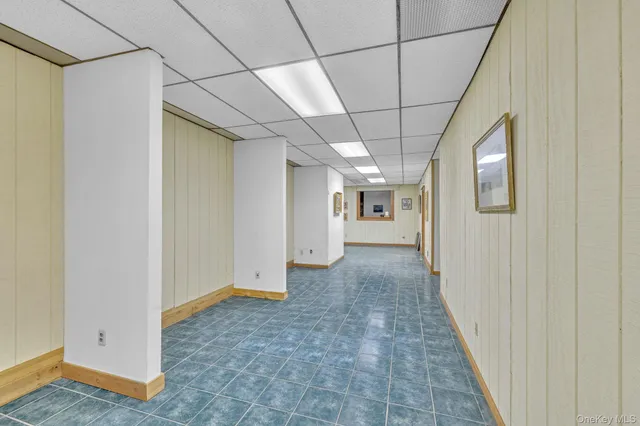 a view of a hallway with a glass door