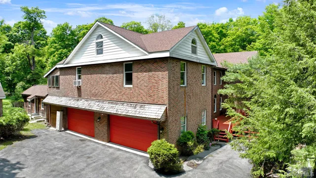 a view of a workspace with furniture