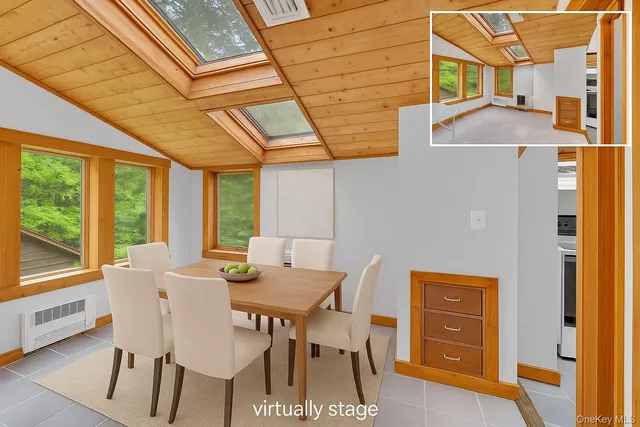 a view of a dining room with furniture window and outside view