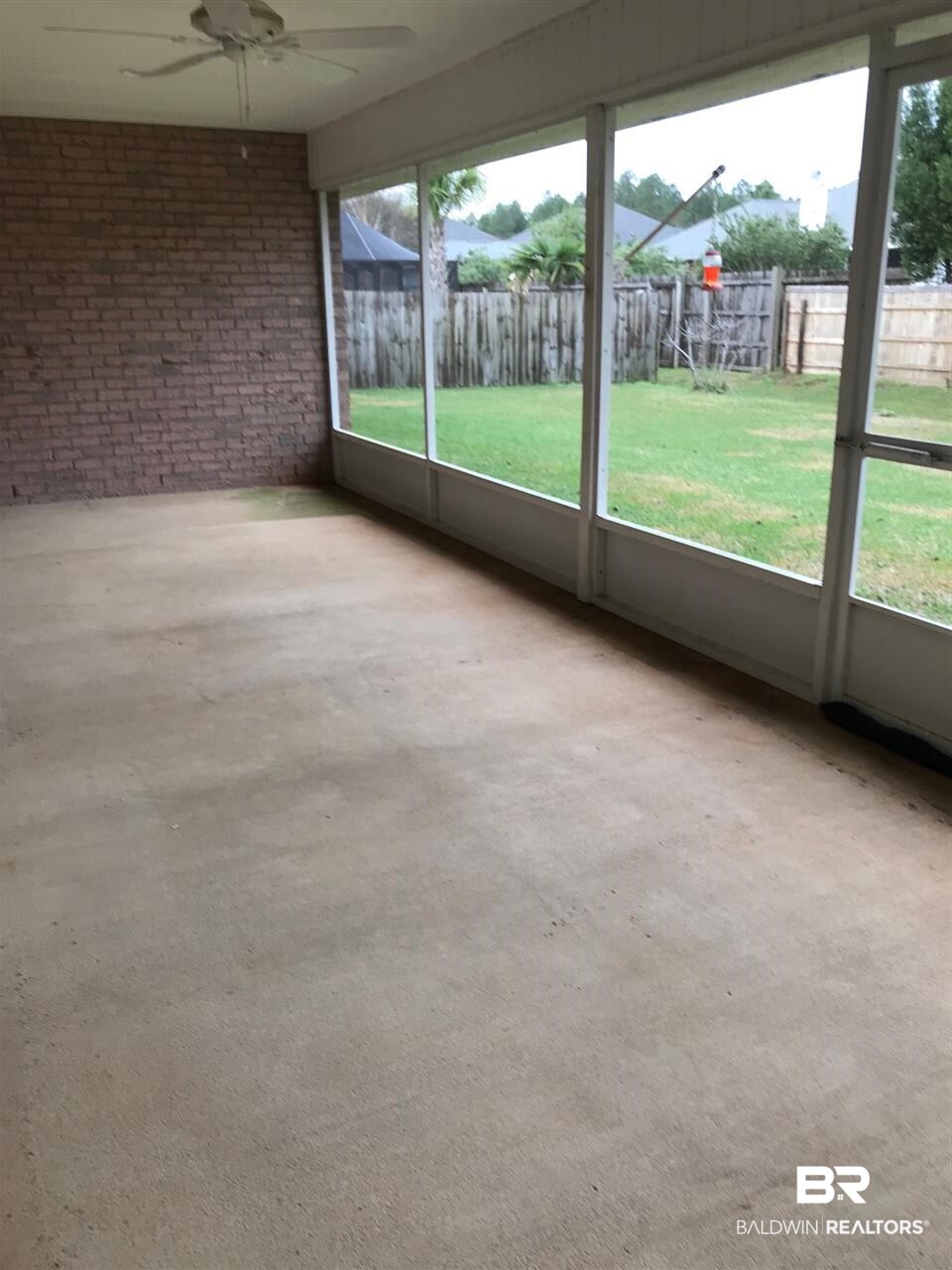 335 Manchester Lane Foley, AL 36535 - Photo 32 of 33 Porch looks out on level back yard!