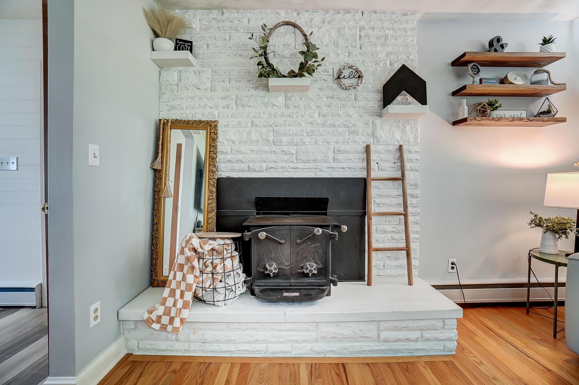 8782 Currier Road Plain City, OH 43064 - Photo 9 of 28 Living Room Fireplace