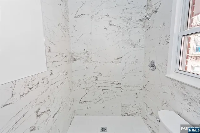 view of a bathroom with a shower