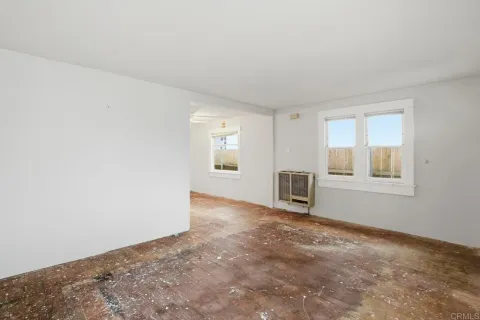 an empty room with windows