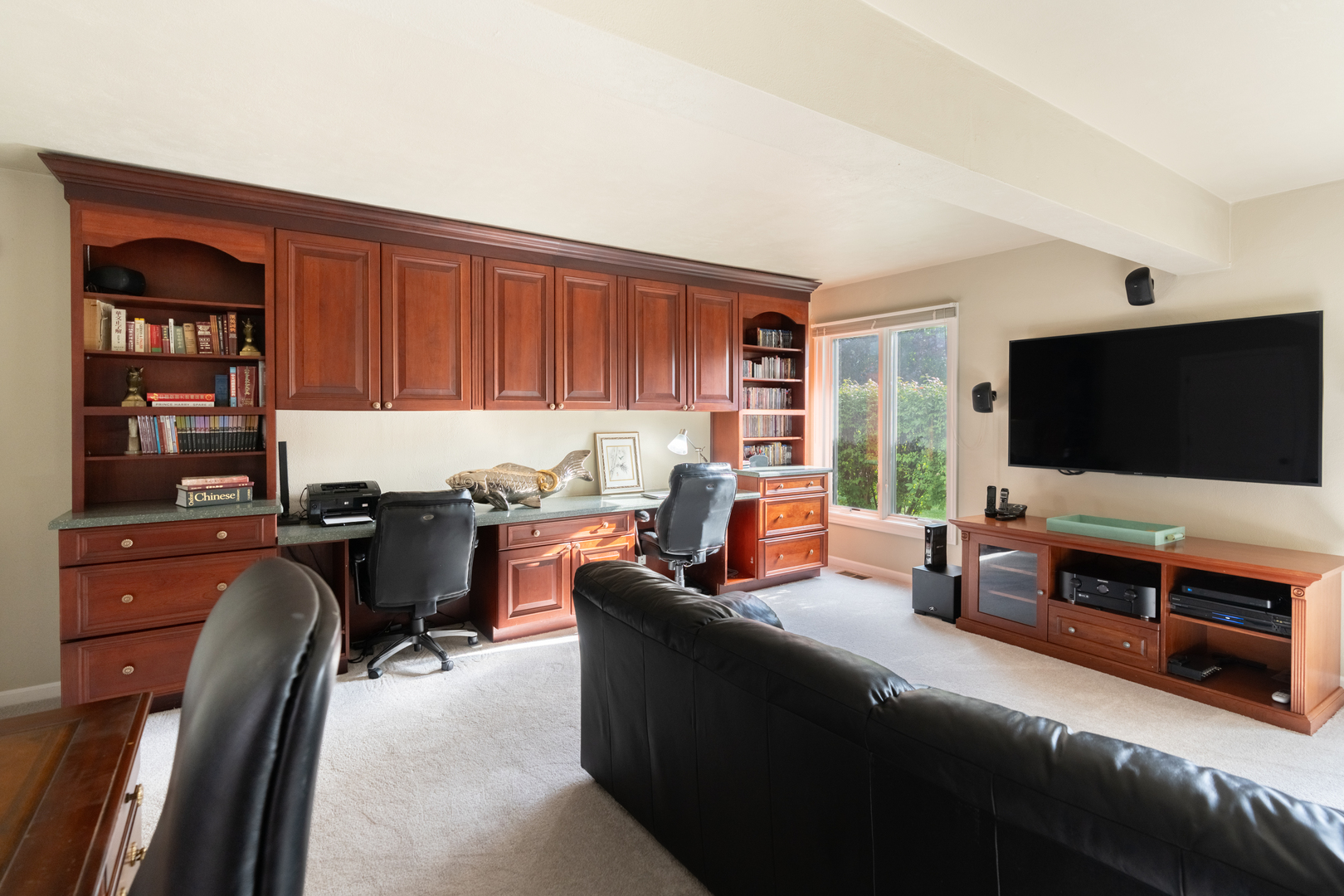 418 West County Line Road Barrington, IL 60010 - Photo 12 of 25 a living room with furniture and a flat screen tv