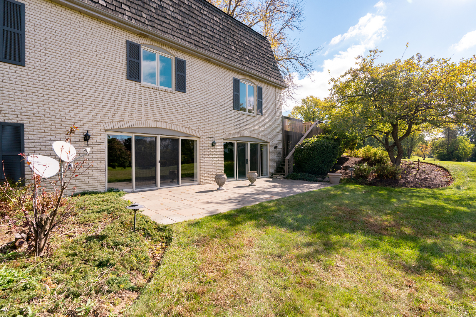 418 West County Line Road Barrington, IL 60010 - Photo 24 of 25 a house view with a garden space