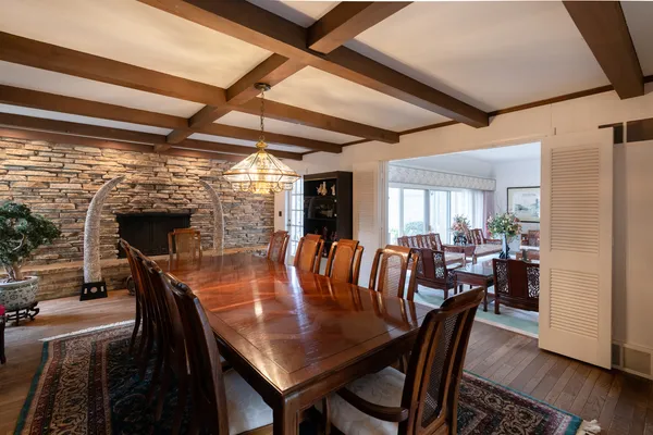 a view of a dining room with furniture window and outside view