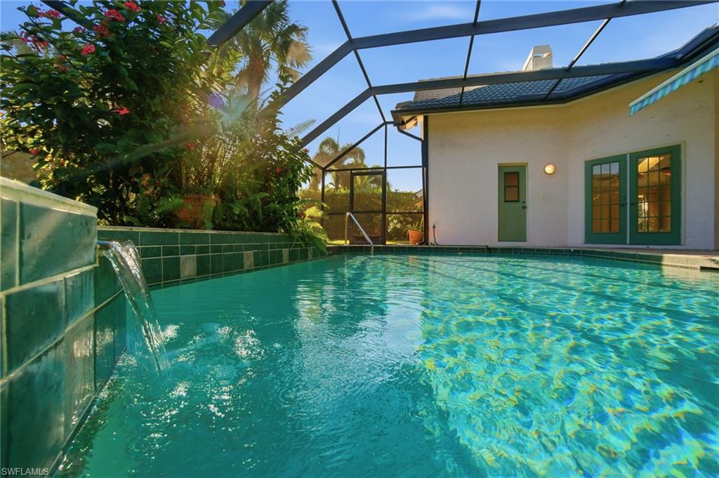 716 Pitch Apple Lane Naples, FL 34108 - Photo 11 of 36 a view of a backyard