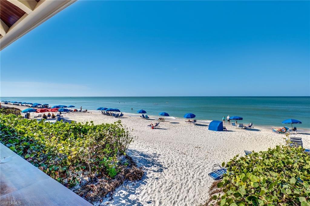 716 Pitch Apple Lane Naples, FL 34108 - Photo 26 of 36 a view of a street with an ocean view