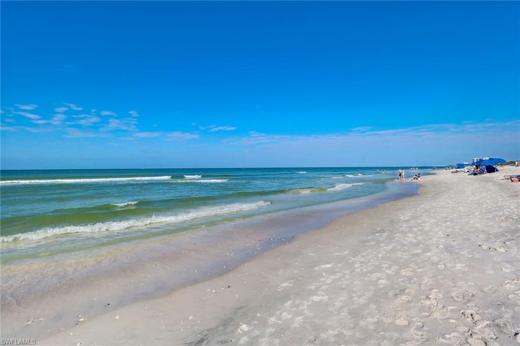 716 Pitch Apple Lane Naples, FL 34108 - Photo 32 of 36 a view of an ocean and beach