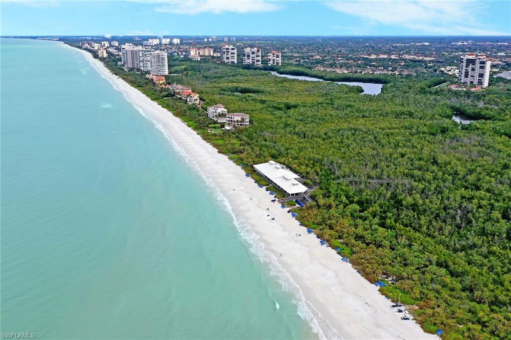 716 Pitch Apple Lane Naples, FL 34108 - Photo 35 of 36 a view of a city and an ocean view
