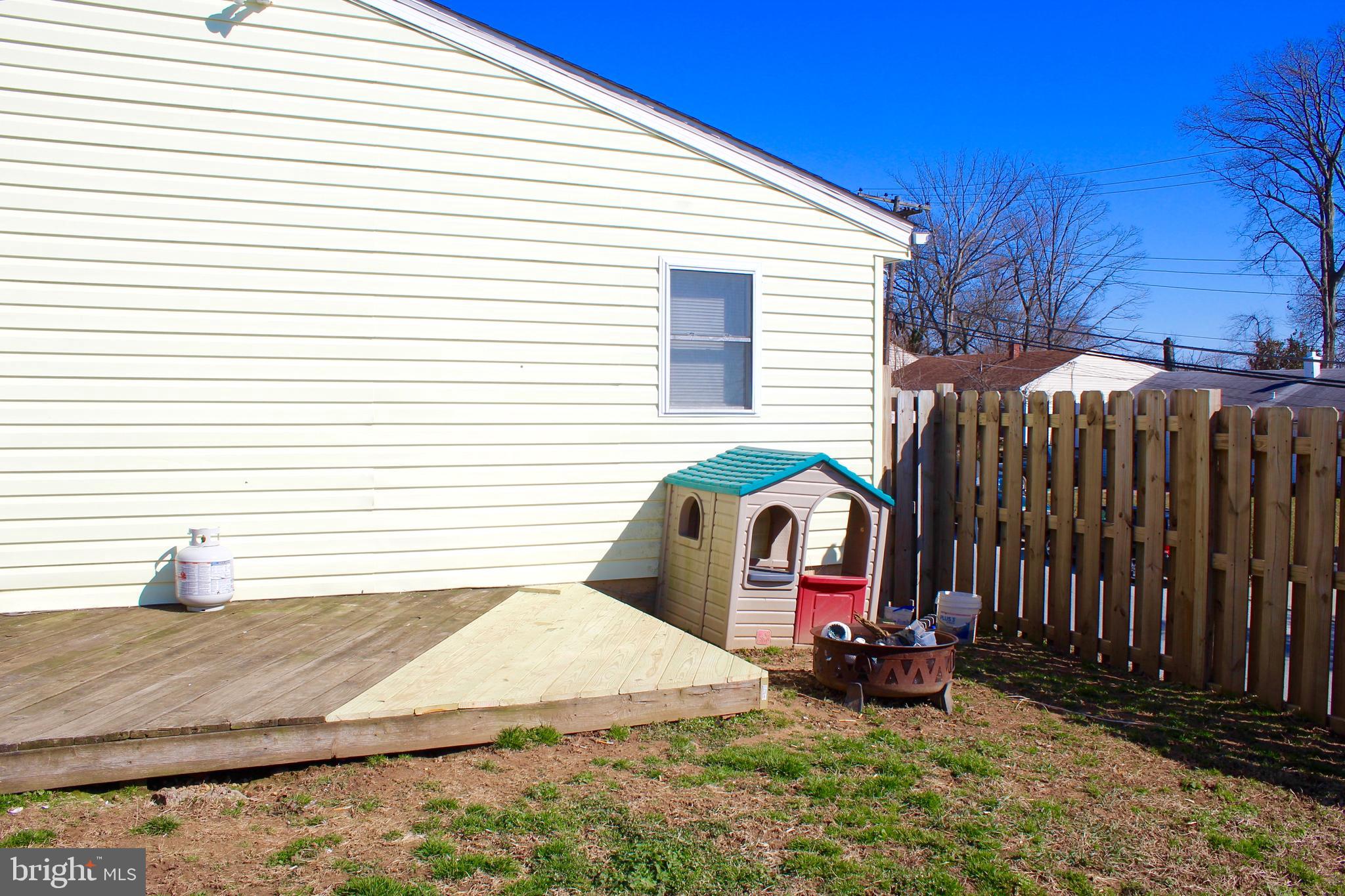 2434 Alma Road Baltimore, MD 21227 - Photo 17 of 21 Perfect back patio for grill and picnic table