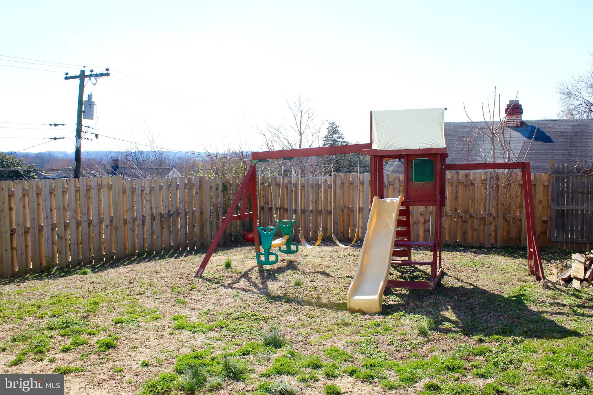 2434 Alma Road Baltimore, MD 21227 - Photo 18 of 21 Perfect fenced yard with playground-private yard!