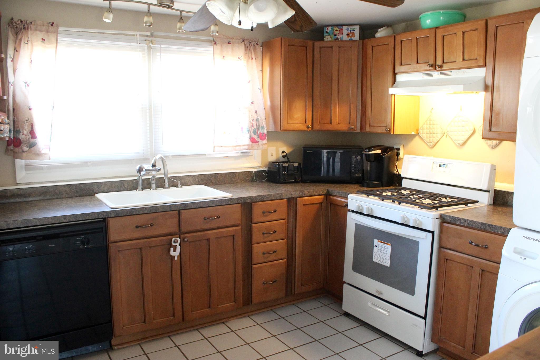 2434 Alma Road Baltimore, MD 21227 - Photo 6 of 21 Updated appliances, cabinets, tile & Gas cooking