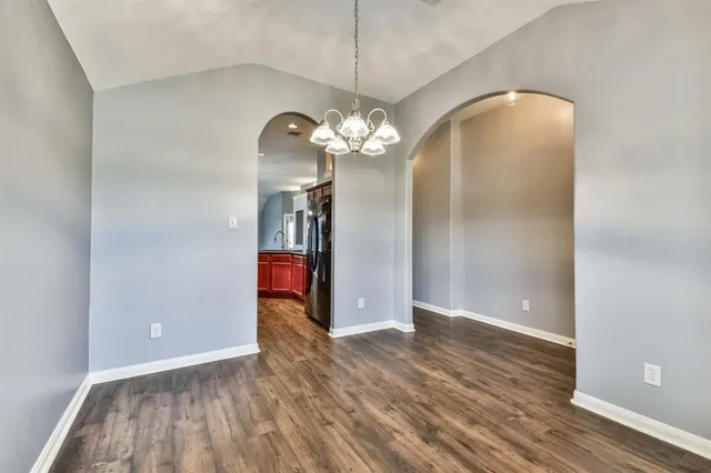 a view of a livingroom with wooden floor
