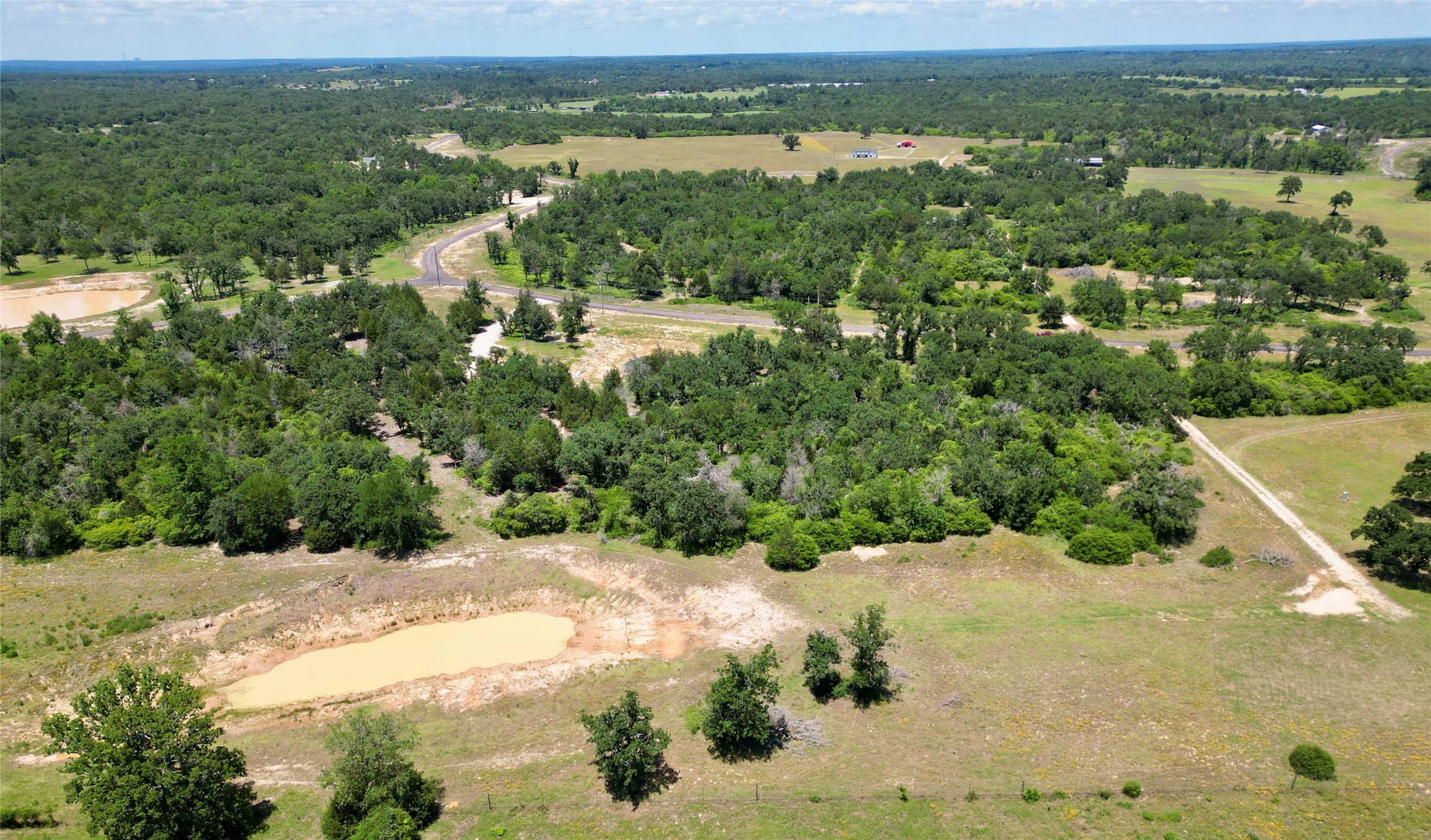 3803 Private 4100 Road Marquez, TX 77865 - Photo 3 of 11 a view of a yard with a lake view
