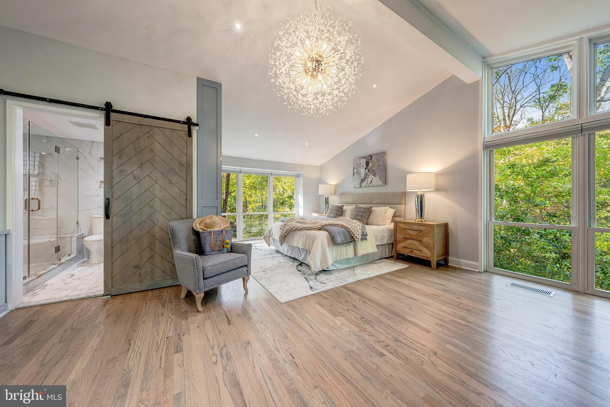 11464 Orchard Lane Reston, VA 20190 - Photo 23 of 64 a bedroom with furniture and a large window