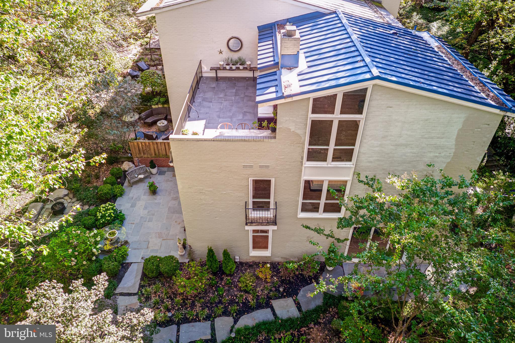 11464 Orchard Lane Reston, VA 20190 - Photo 54 of 64 a view of a house with a yard and potted plants
