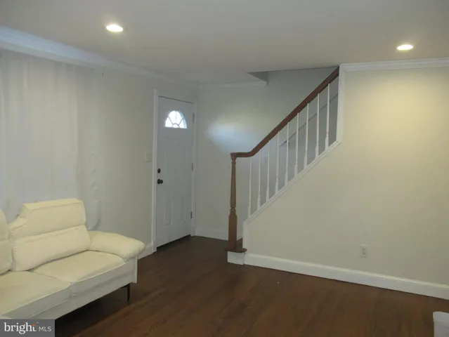 a view of livingroom with furniture and wooden floor
