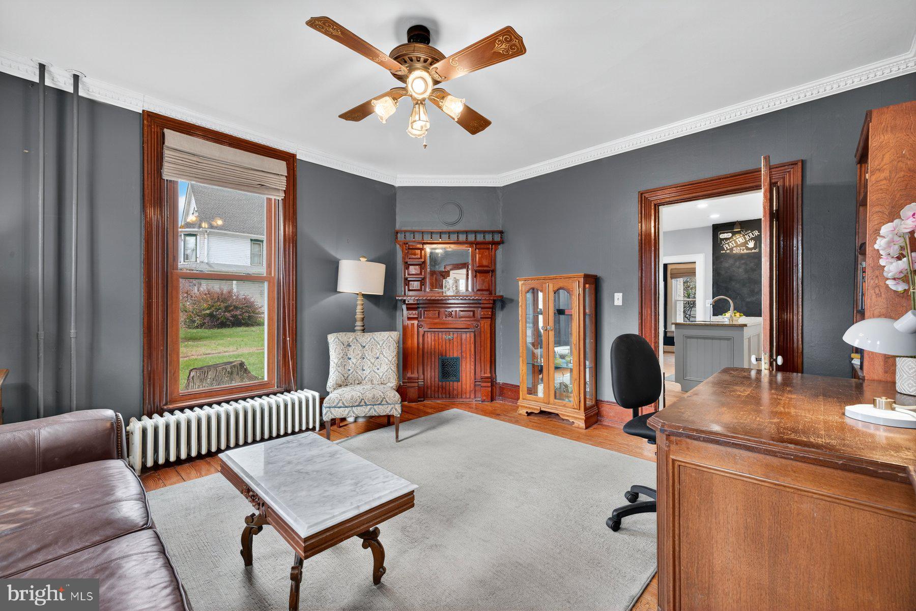 58 East Baltimore Street Taneytown, MD 21787 - Photo 11 of 56 a living room with furniture and a window