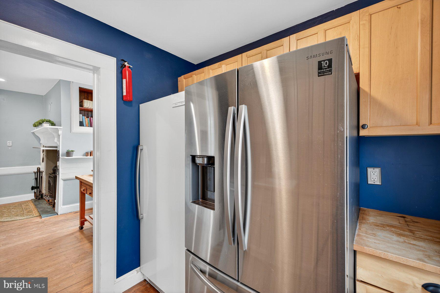 58 East Baltimore Street Taneytown, MD 21787 - Photo 19 of 56 a refrigerator freezer sitting inside of a kitchen