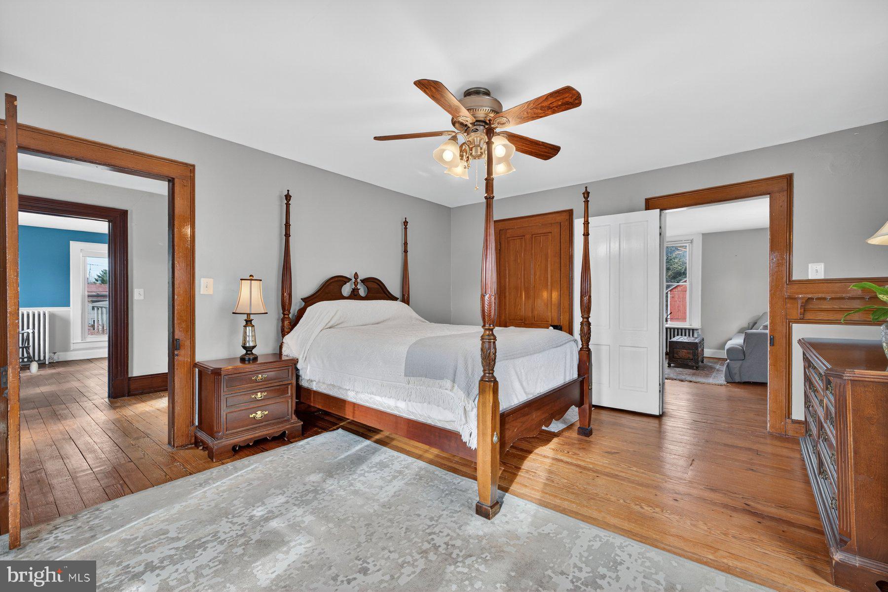 58 East Baltimore Street Taneytown, MD 21787 - Photo 24 of 56 a bedroom with a bed and wooden floor