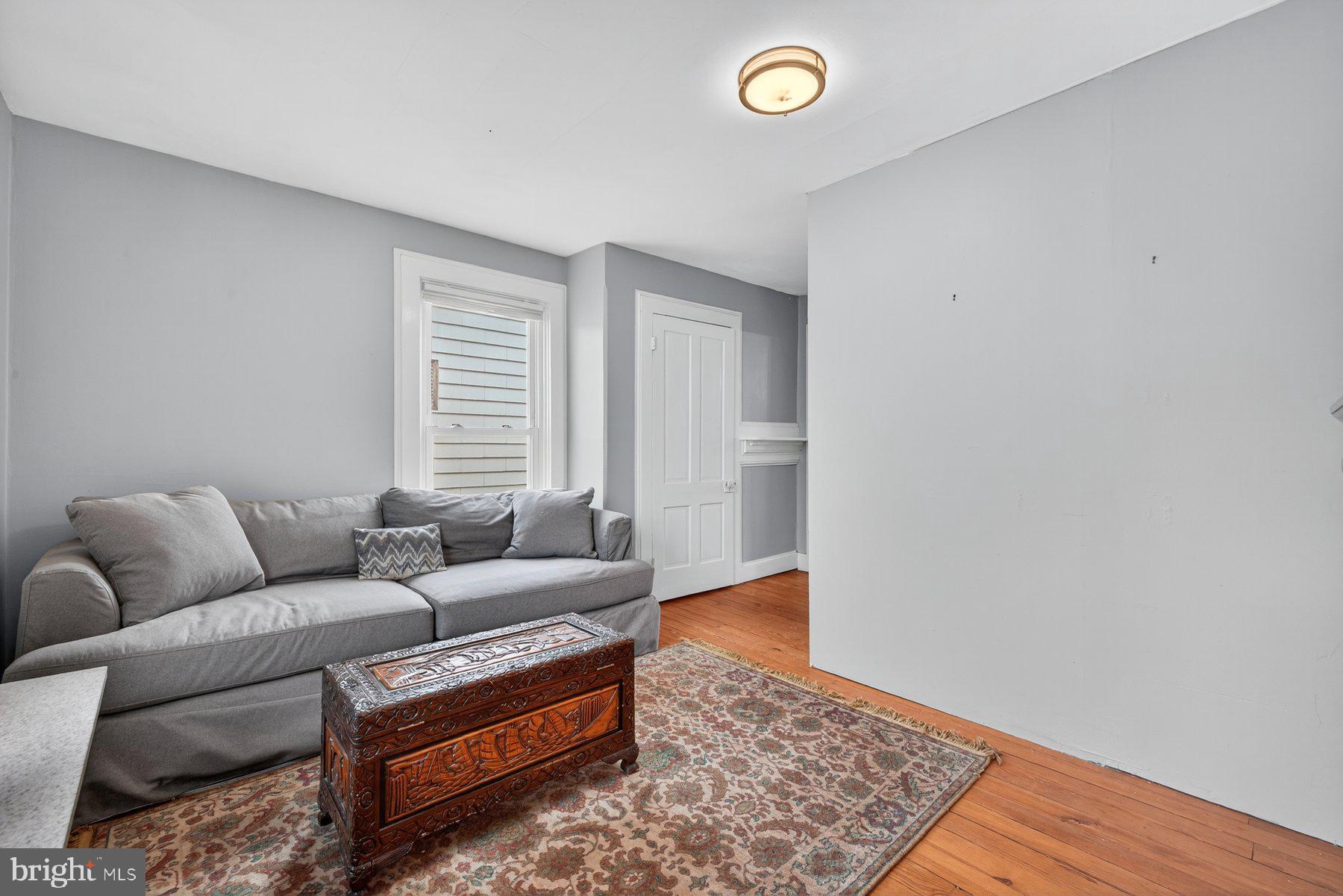 58 East Baltimore Street Taneytown, MD 21787 - Photo 27 of 56 a living room with furniture and a rug