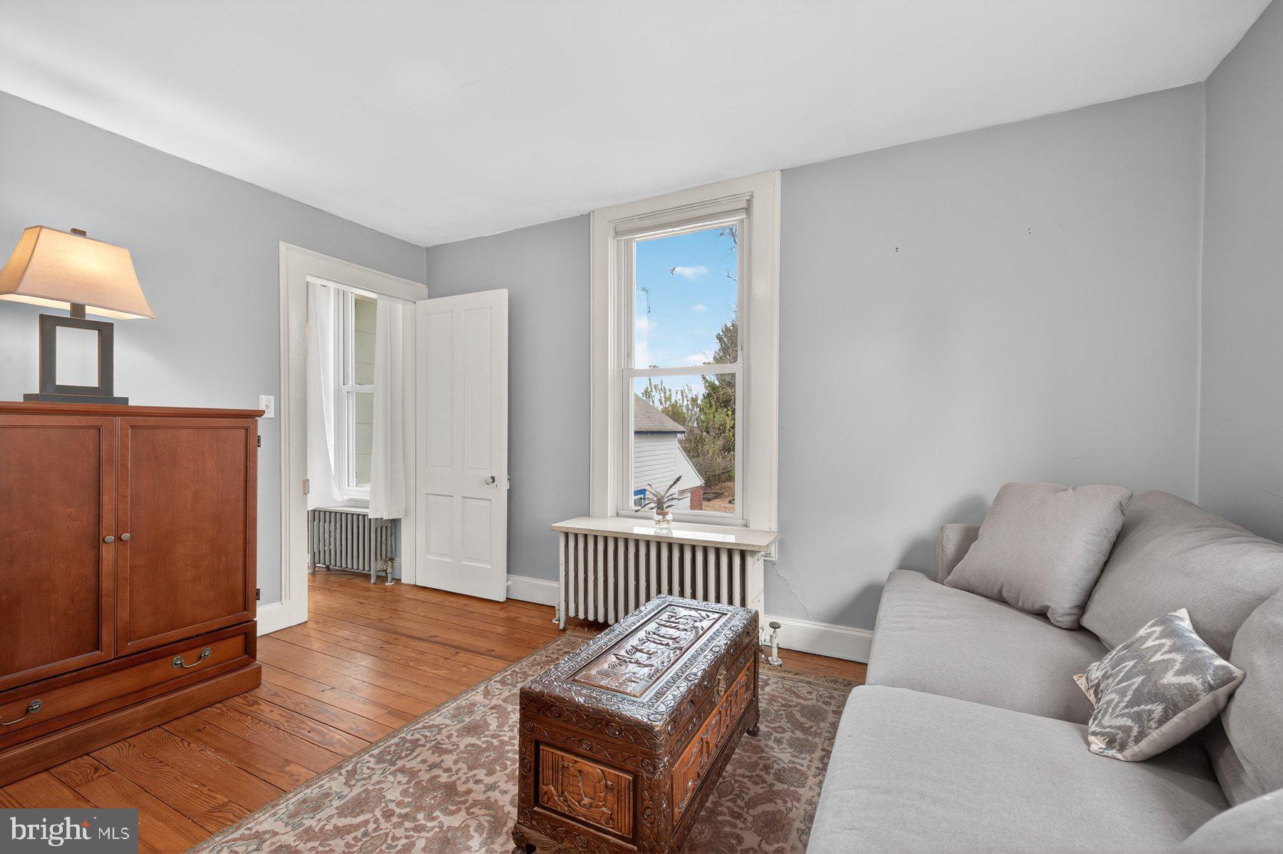 58 East Baltimore Street Taneytown, MD 21787 - Photo 28 of 56 a living room with furniture and a window