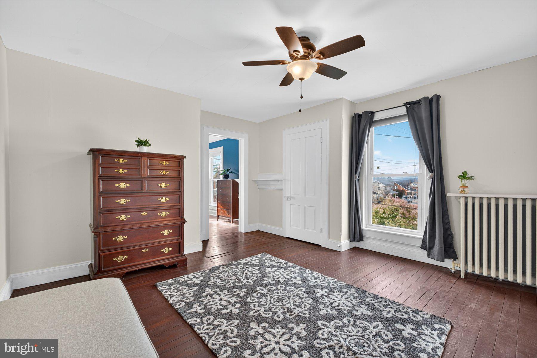 58 East Baltimore Street Taneytown, MD 21787 - Photo 33 of 56 an empty room with windows and closet