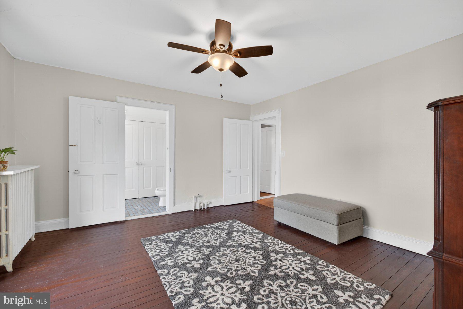 58 East Baltimore Street Taneytown, MD 21787 - Photo 34 of 56 a living room with a bed furniture and a window
