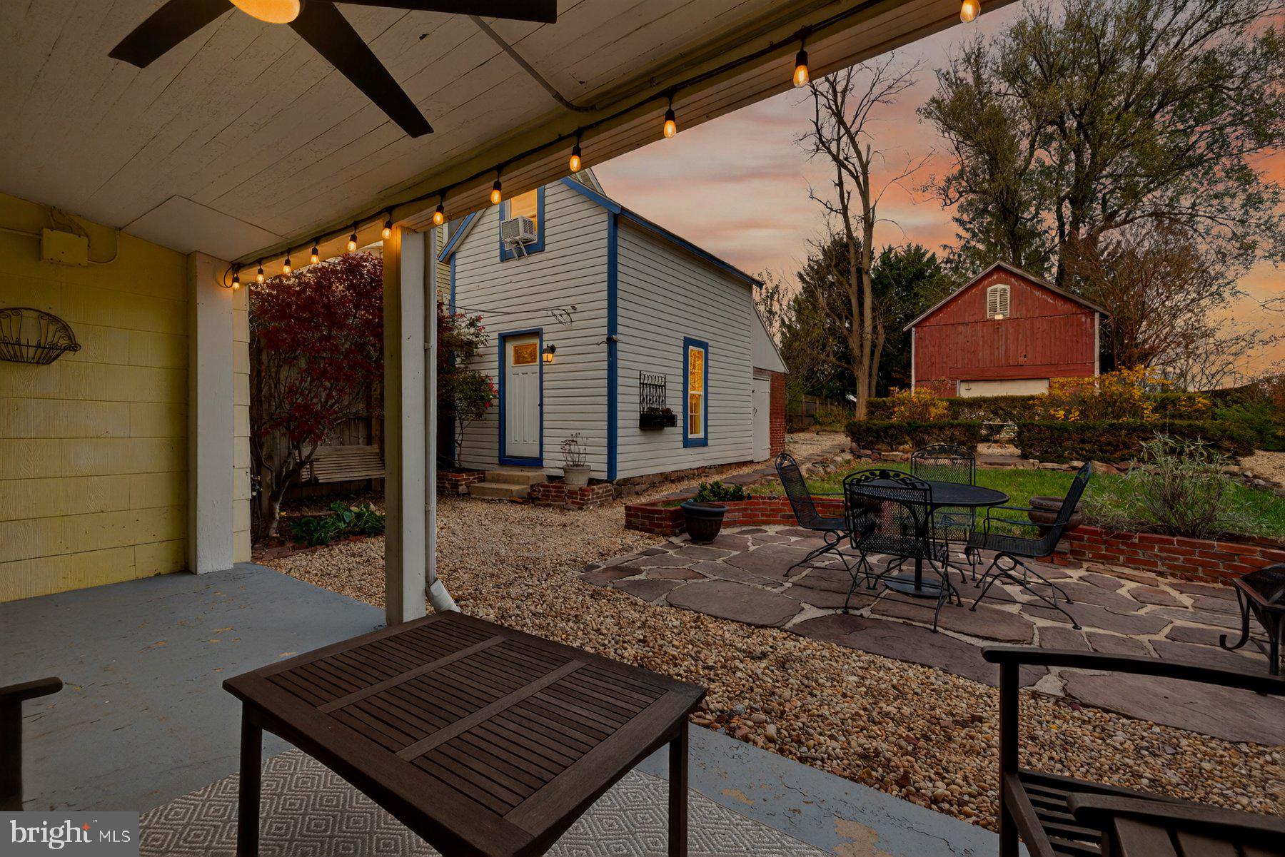 58 East Baltimore Street Taneytown, MD 21787 - Photo 38 of 56 a backyard of a house with table and chairs