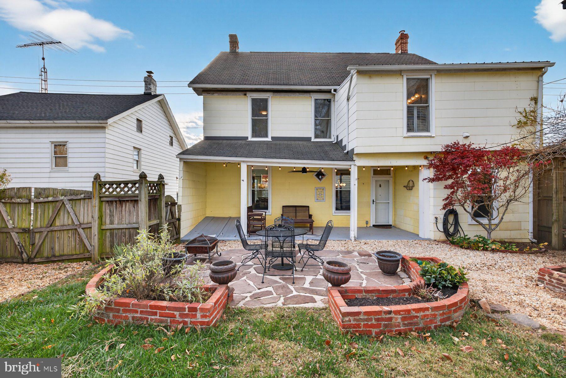 58 East Baltimore Street Taneytown, MD 21787 - Photo 40 of 56 a front view of a house with a patio