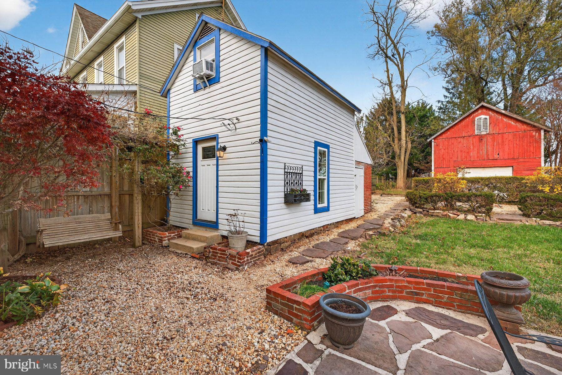 58 East Baltimore Street Taneytown, MD 21787 - Photo 41 of 56 a backyard of a house with yard and outdoor seating