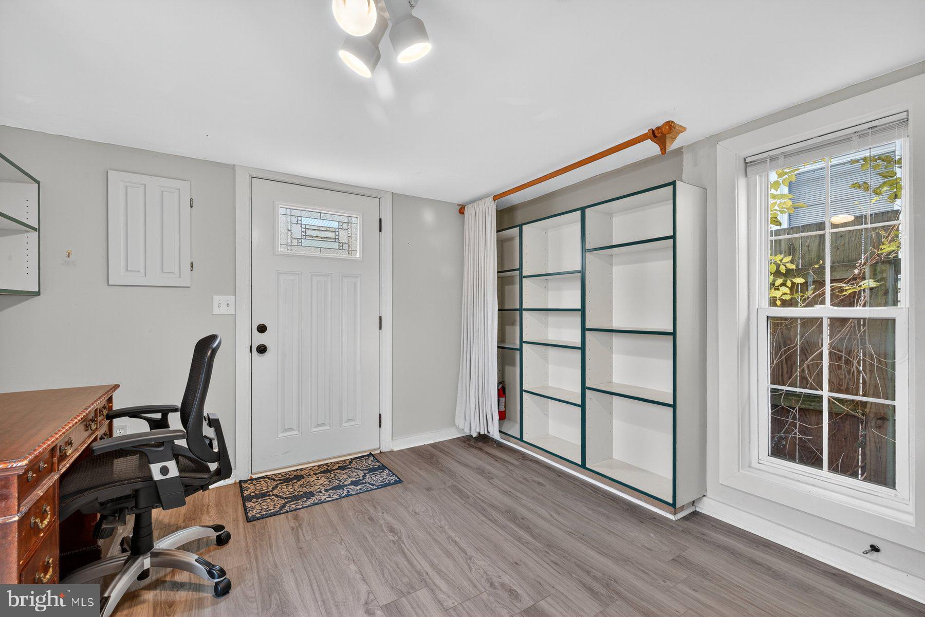 58 East Baltimore Street Taneytown, MD 21787 - Photo 42 of 56 a view of a workspace with furniture and a window