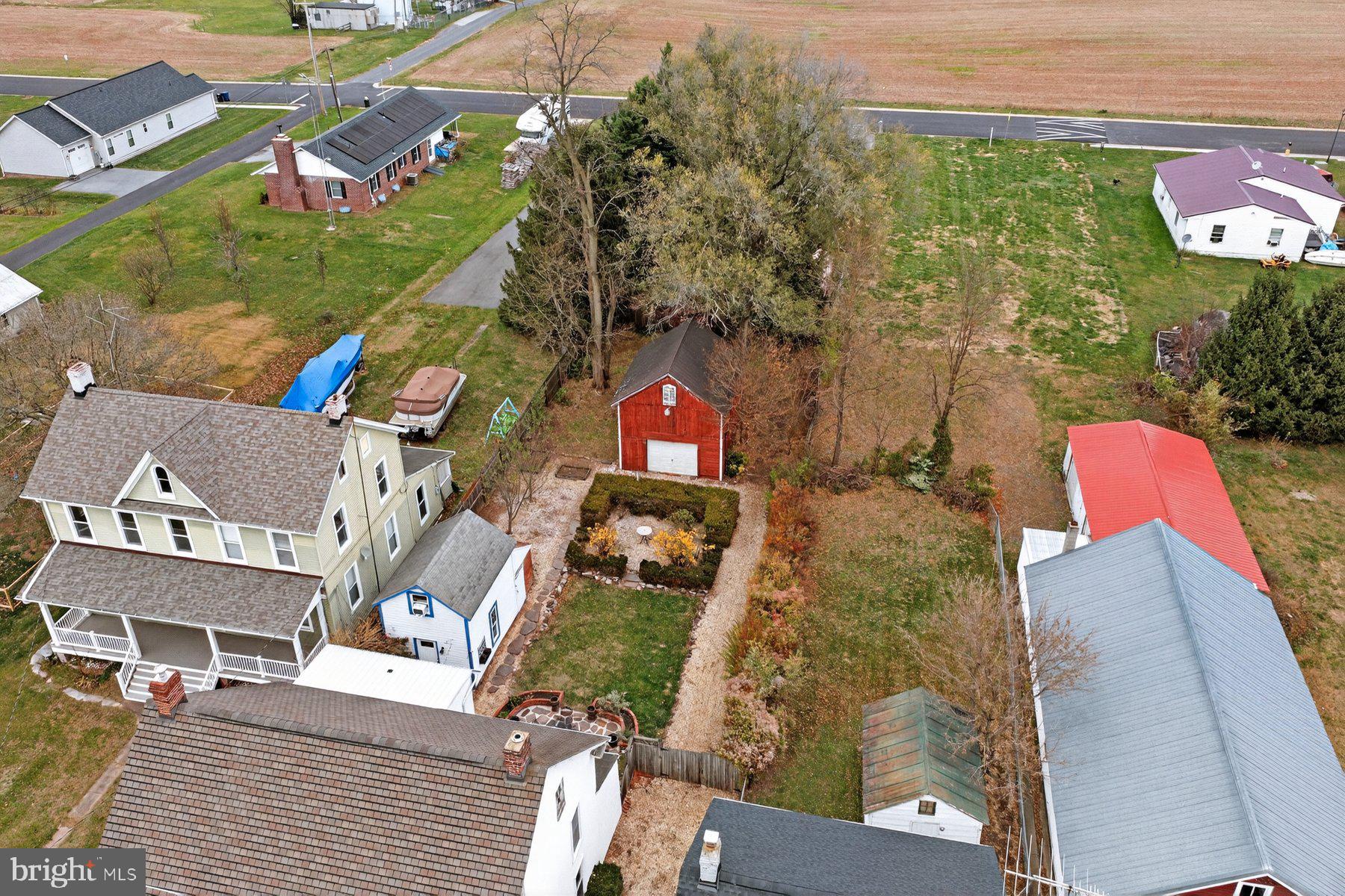 58 East Baltimore Street Taneytown, MD 21787 - Photo 50 of 56 an aerial view of residential houses with outdoor space