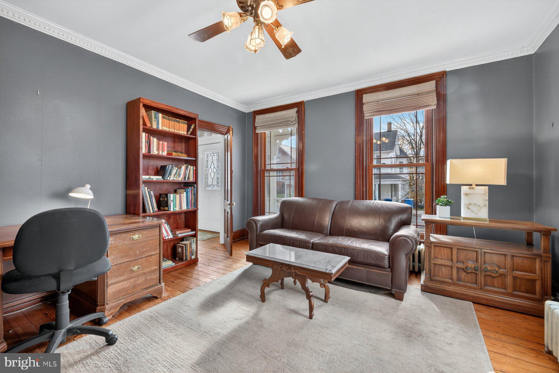 58 East Baltimore Street Taneytown, MD 21787 - Photo 10 of 56 a living room with furniture and a window