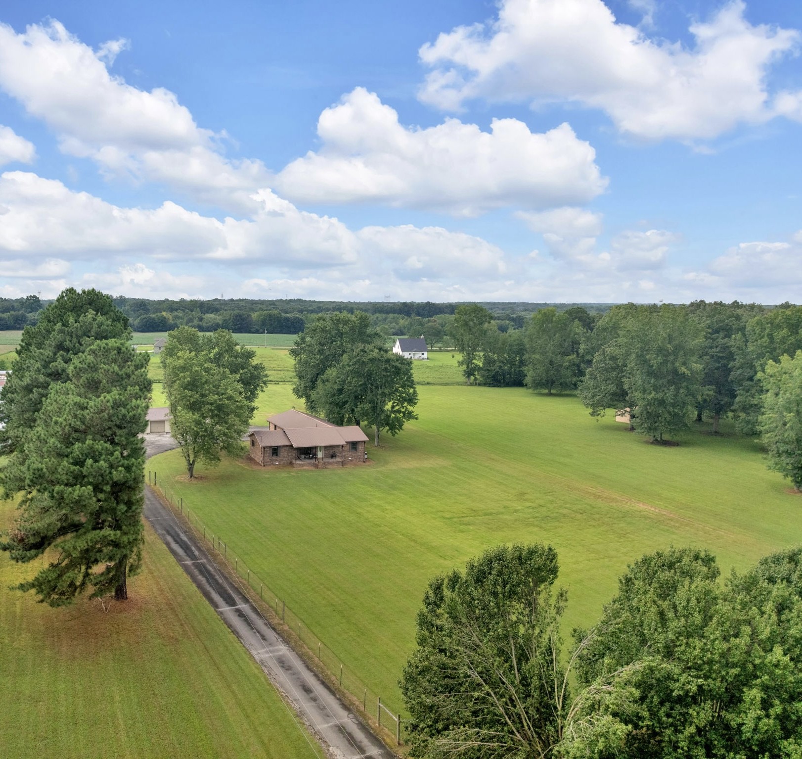 93 Jean Drive Tullahoma, TN 37388 - Photo 1 of 53 a view of a lake with a big yard