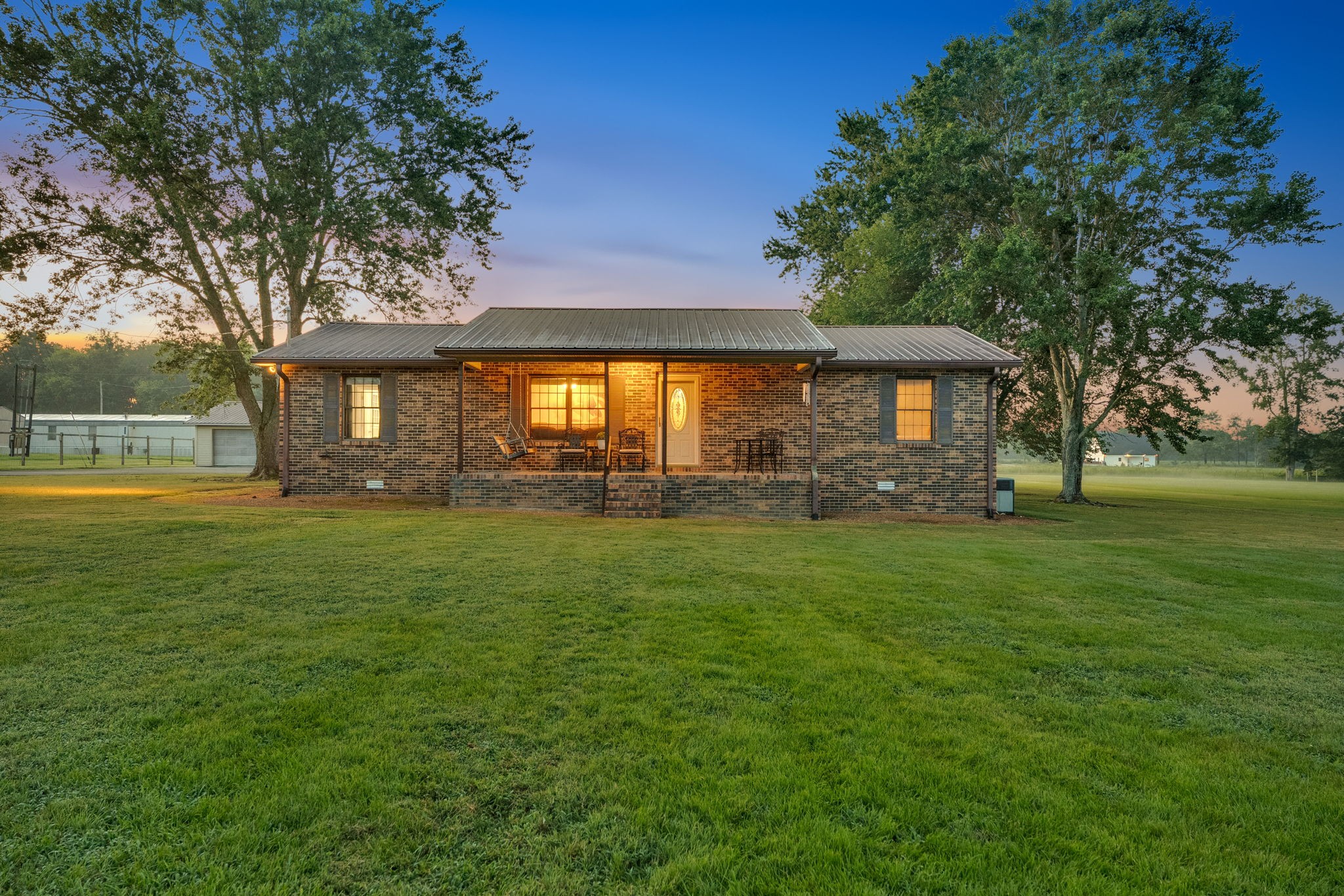 93 Jean Drive Tullahoma, TN 37388 - Photo 6 of 53 a front view of a house with a garden