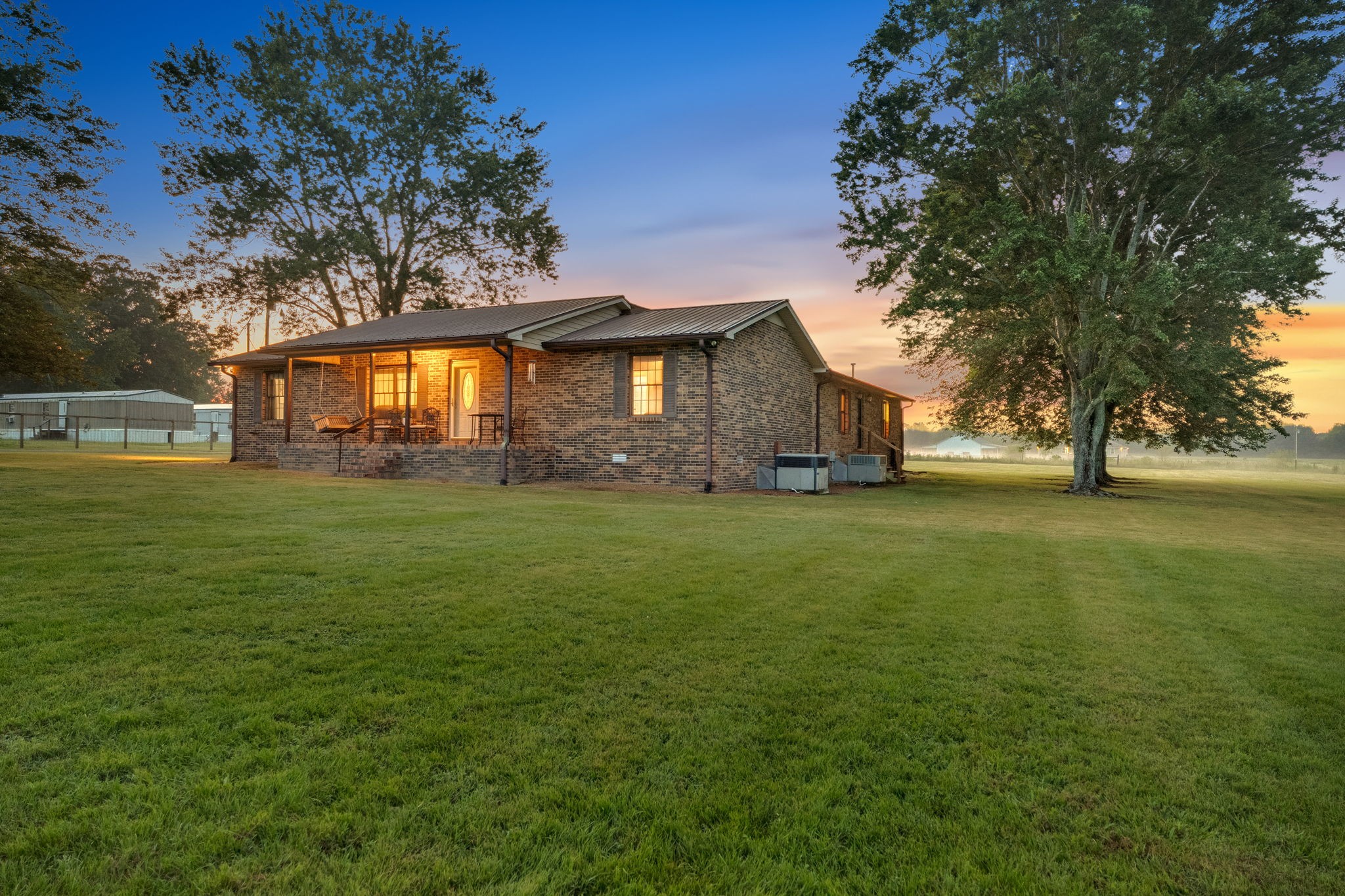 93 Jean Drive Tullahoma, TN 37388 - Photo 7 of 53 a front view of house with yard and trees