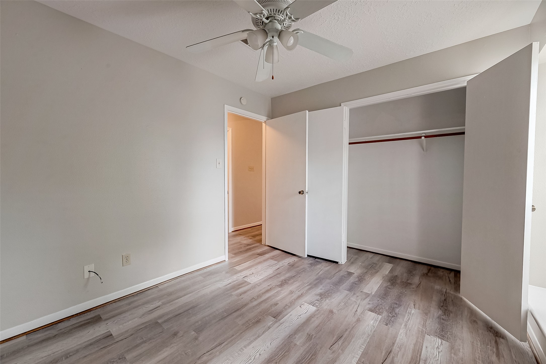11503 Meadow Lane, Unit D Houston, TX 77477 - Photo 25 of 39 wooden floor in an empty room