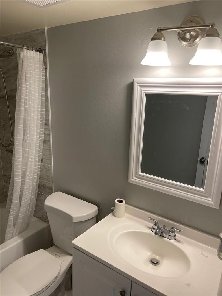 1112 North Hiatus Road, Unit 1112 Pembroke Pines, FL 33026 - Photo 14 of 48 a bathroom with a sink and a toilet
