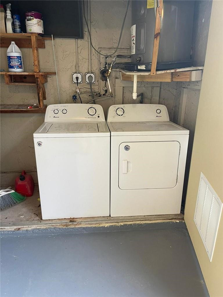 1112 North Hiatus Road, Unit 1112 Pembroke Pines, FL 33026 - Photo 36 of 48 a utility room with dryer and washer