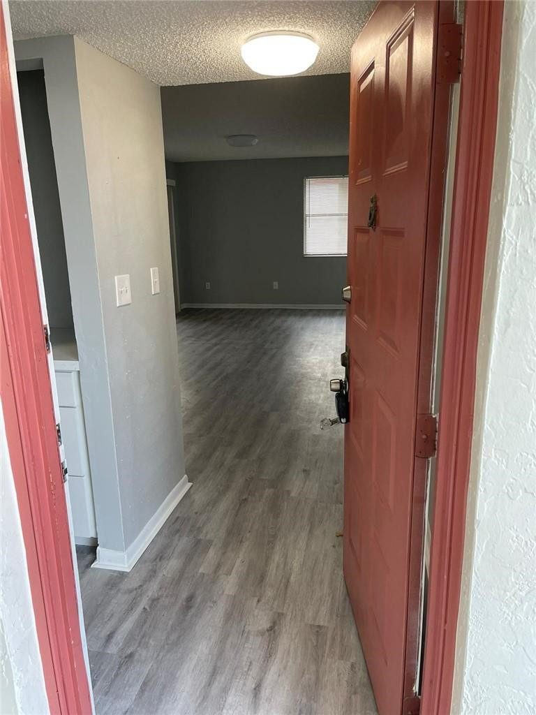 1112 North Hiatus Road, Unit 1112 Pembroke Pines, FL 33026 - Photo 38 of 48 a view of a hallway