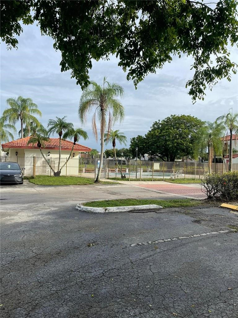 1112 North Hiatus Road, Unit 1112 Pembroke Pines, FL 33026 - Photo 48 of 48 a view of outdoor space and yard