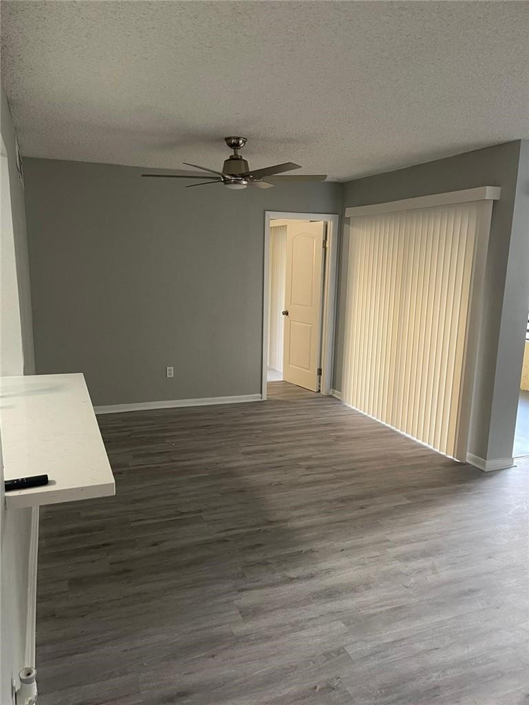 1112 North Hiatus Road, Unit 1112 Pembroke Pines, FL 33026 - Photo 7 of 48 a view of an empty room with a window