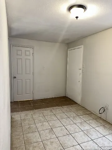 a view of an empty room with window