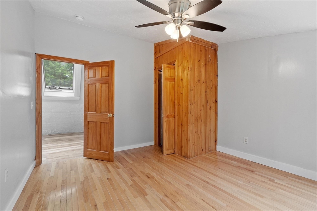 258 Allen Road Ashby, MA 01431 - Photo 30 of 36 wooden floor in an empty room with a window