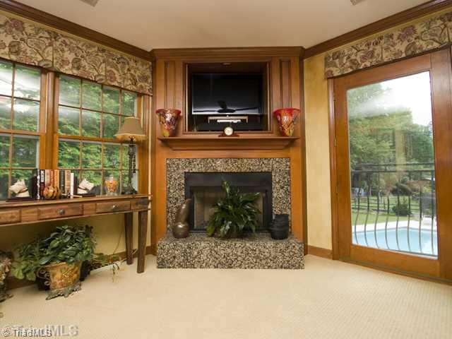 5609 Tower Road Greensboro, NC 27410 - Photo 6 of 12 Den/Family/Great Room. Handsome corner fireplace with granite.