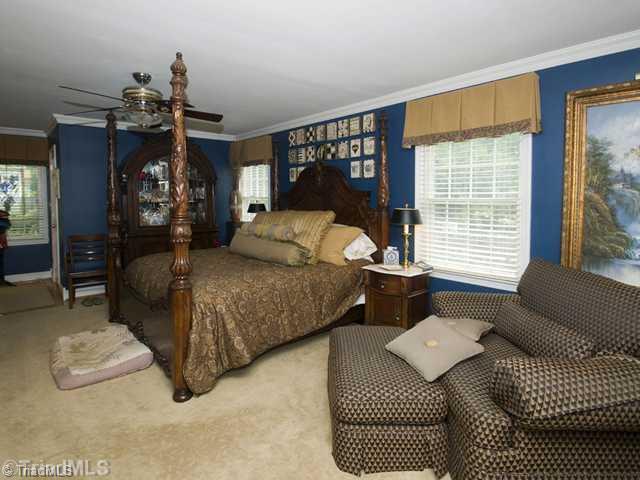5609 Tower Road Greensboro, NC 27410 - Photo 7 of 12 Master Bedroom. Large master bedroom with walk in closet.