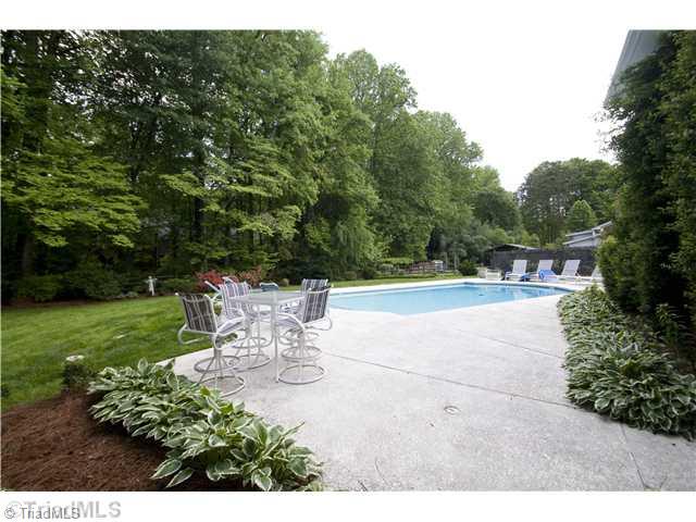 5609 Tower Road Greensboro, NC 27410 - Photo 10 of 12 Swimming Pool/Hot Tub/Sauna. AAAHHHH!!! What a lovely way to enjoy Summer!