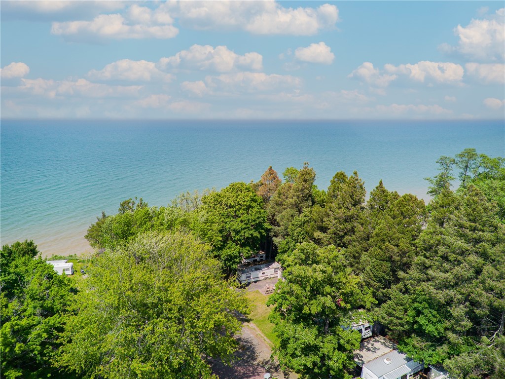 7945 Lake Road, Unit 129 Sodus, NY 14555 - Photo 2 of 22 The soul soothing sunsets- quiet walks or entertaining in the common area (if you prefer!)
